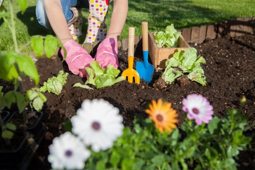 Gardening team planning work and pricing details